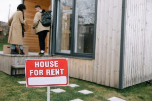 A diverse group of potential tenants viewing a rental property